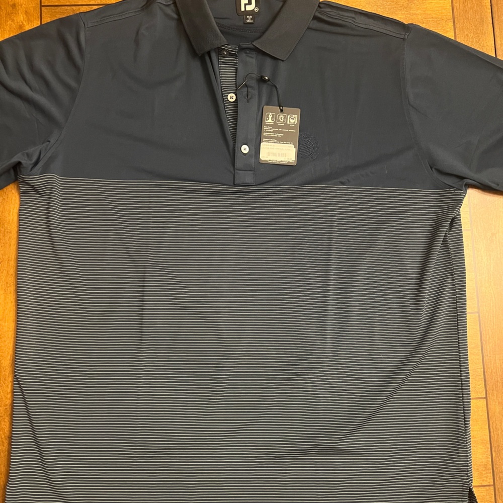 Dell Match Play golf shirt-tags still attached